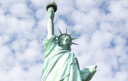 Fourth of July Special: Woman Climbs the Statue of Liberty to Protest